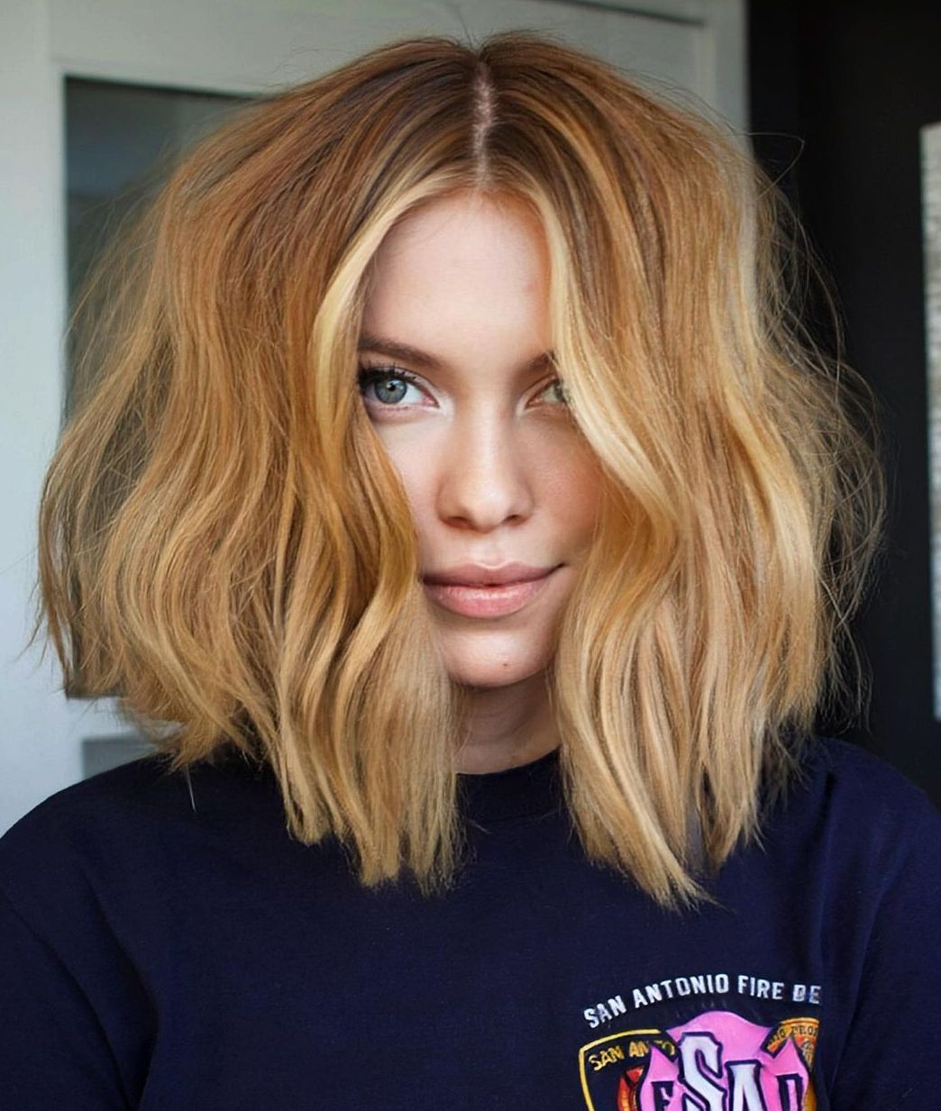 Thick Messy Copper Blonde Lob Hairstyle